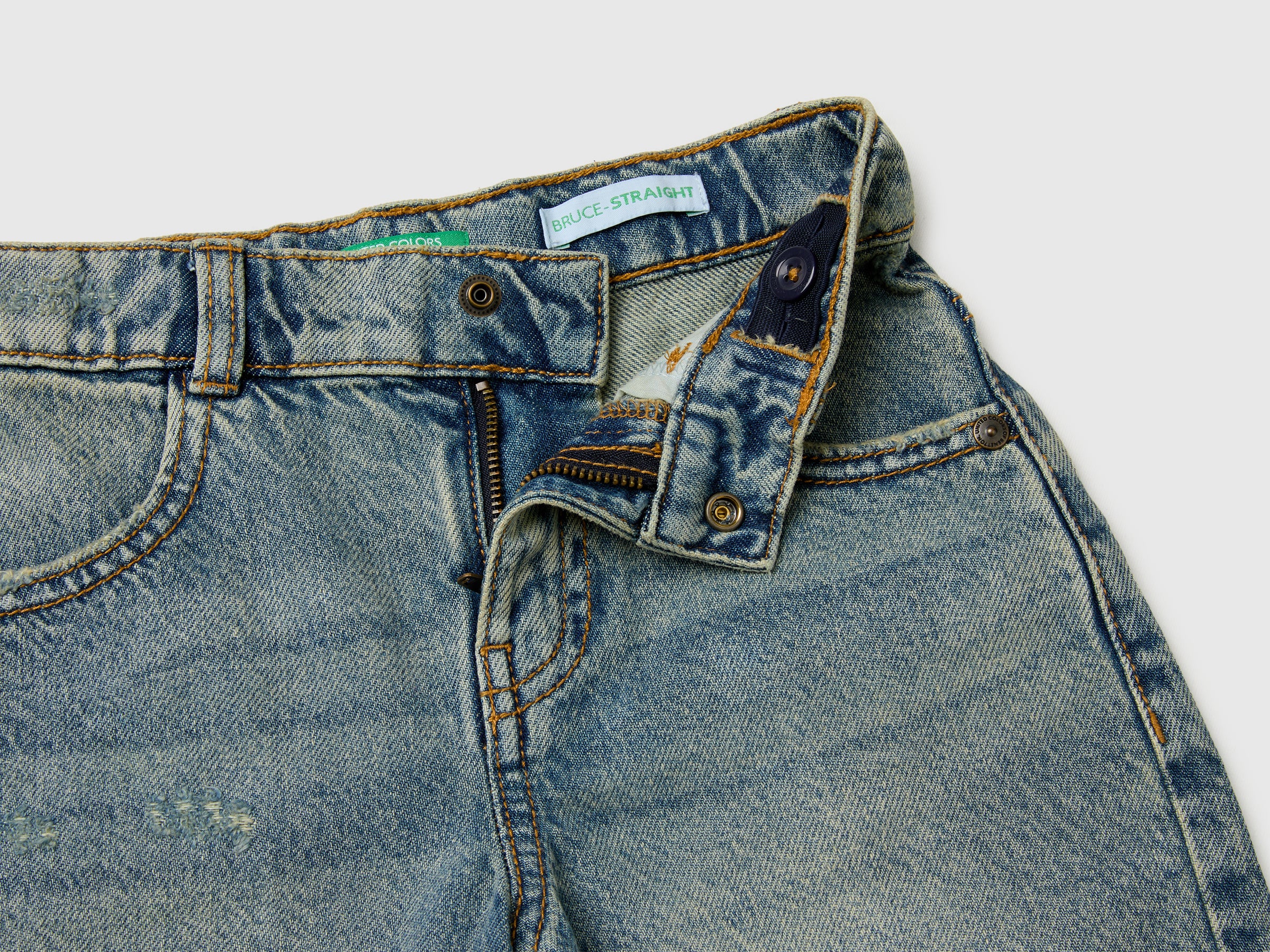 Used-effect denim Bermuda shorts - ucb_image_DS1