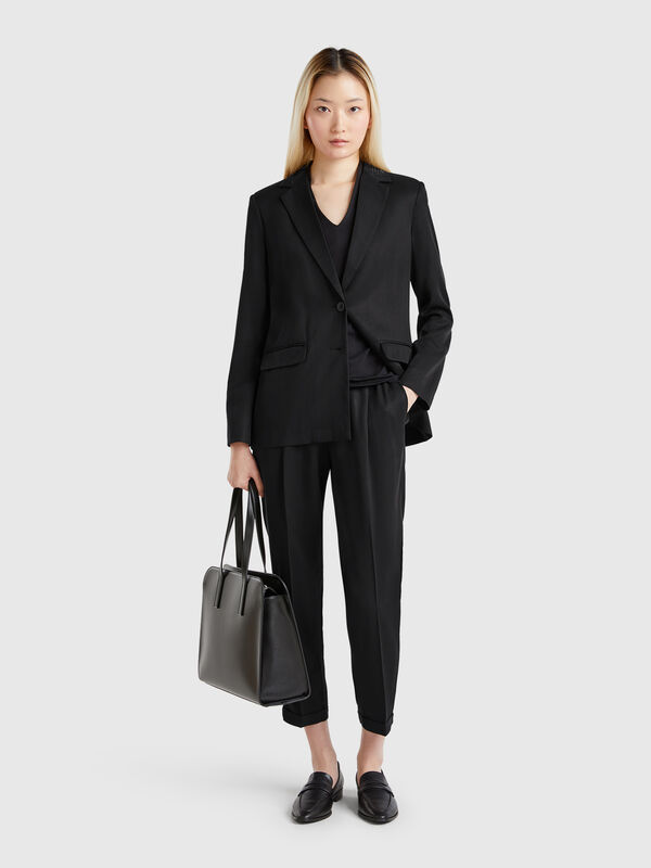 Flowy trousers with cuffs Women