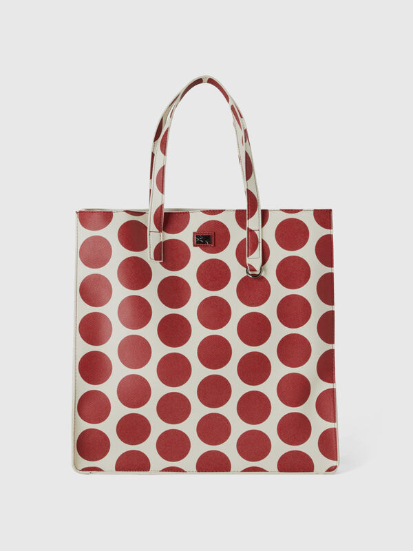 White shopping bag with red polka dots