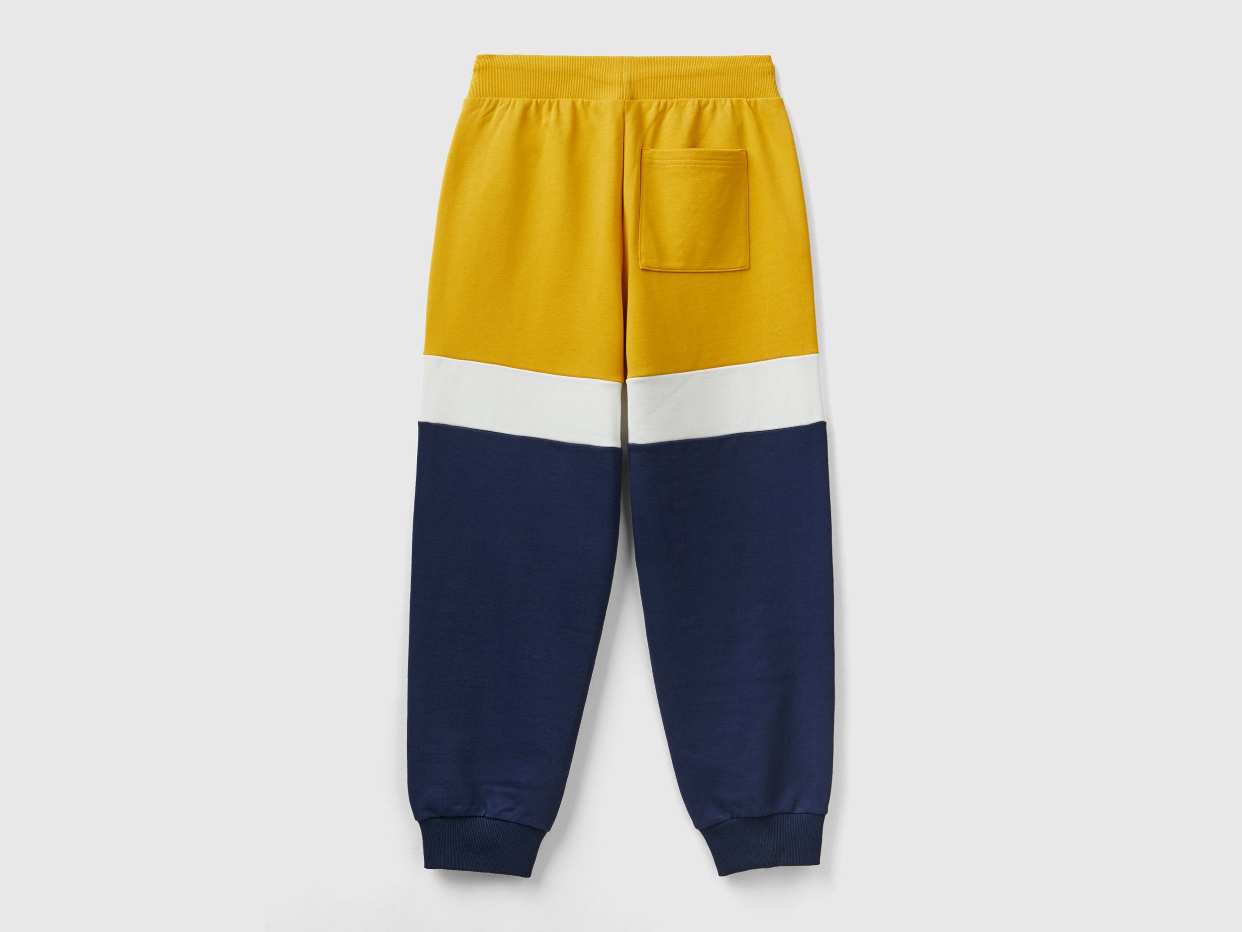 Yellow ochre and dark blue joggers Yellow Benetton