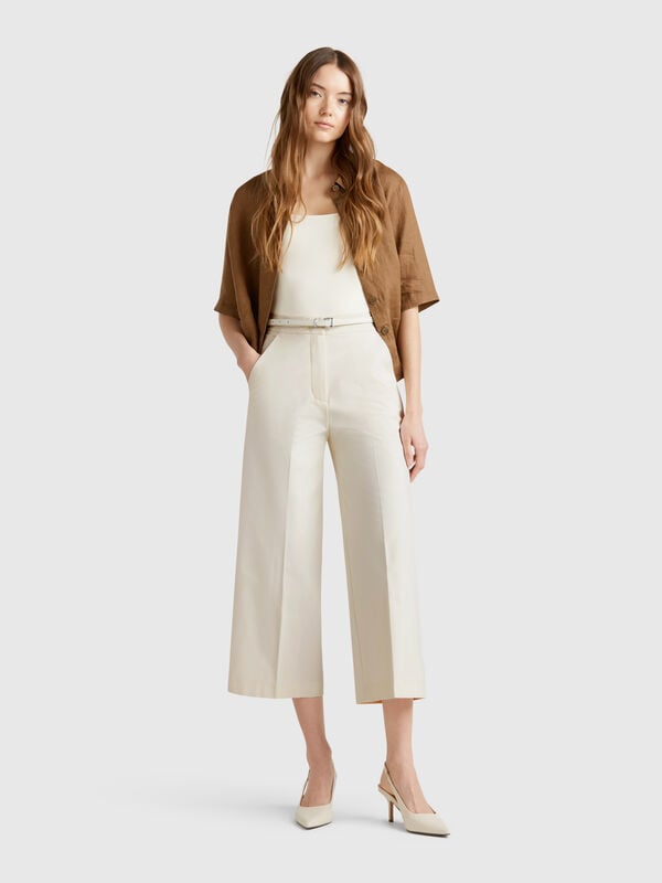 Cropped high-waisted trousers Women